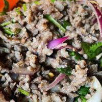 Larb · Choice of ground beef, pork or chicken. Made with toasted sticky rice powder, red onions, li...