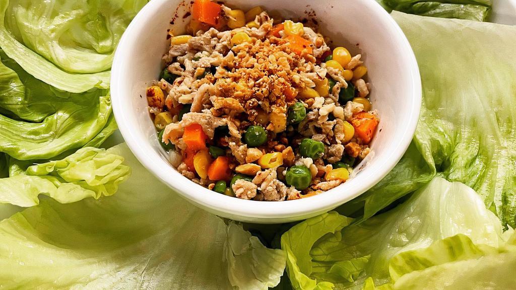Let'S Eat Wrap · Ground chicken, corn, pea, carrot, onion, ground peanut, served with house green leaves and cucumber salad.