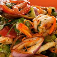 Seafood Salad · salad with shrimps, squid, scallop, mussel, tomato, onion, cilantro and chili paste with spi...