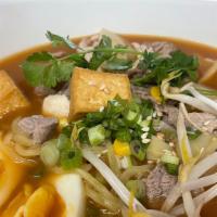 Ramen Miso · Japanese egg noodle, choice of chicken, pork, beef, veggies, tofu or seafood with bean sprou...