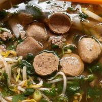 Thai Pho · Small rice noodles with sliced beef, beef ball, onion, green onion and bean sprout in a thai...