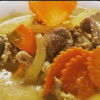C3 Yellow Curry · Simmered in yellow curry spices with coconut milk,potato, onion and carrot, served with whit...