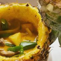 C7 Pieapple Curry · Simmered in red curry pineapple sauce with green beans, bell peppers , onion, basil, served ...