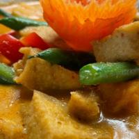 C5 Pumpkin Curry · Simmered in red curry spices with coconut milk, green bean, bell peppers, pumpkin and basil,...