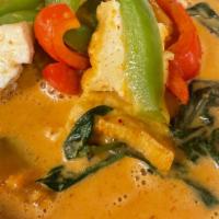 Pumpkin Curry · Thai red curry paste in coconut milk, pumpkin, bell pepper and sweet basil leaves.