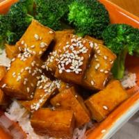 Tofu Teriyaki  · Tufu with teriyaki sauce, served with rice and steam broccoli.