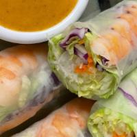 Salad Roll · Lettuce, carrot, rice noodle, wrapped in soft rice paper served with peanut sauce.