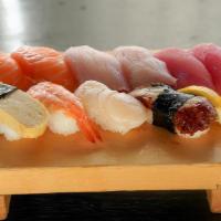 Nigiri Set · 10 pieces. Salmon 2 pieces, tuna 2 pieces, hamachi 2 pieces, tamago 1 piece, ebi 1 piece, ho...