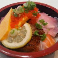 Omakase Chirashi · Bowl of sushi rice, sesame seeds, salmon 3 pieces, tuna 3 pieces, hamachi 3 pieces, BBQ eel ...