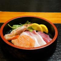 Combination Sashimi · 8 pieces. Salmon 2 pieces, hamachi 2 pieces, tuna 2 pieces, scallop 1 pieces, red shrimp 1 p...