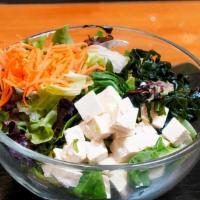 Green Salad · Spring mix, yellow onion, carrot, tofu, wakame sweet soy dressing, mayo
