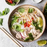 Chicken Pho Thai Style · Sliced chicken breast, egg noodles, cabbage, and bean sprouts in a fresh chicken broth. Topp...