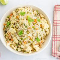 Fried Rice · Delicious fried rice prepared with onions, tomatoes, carrots, green onions, bok choy, and egg.