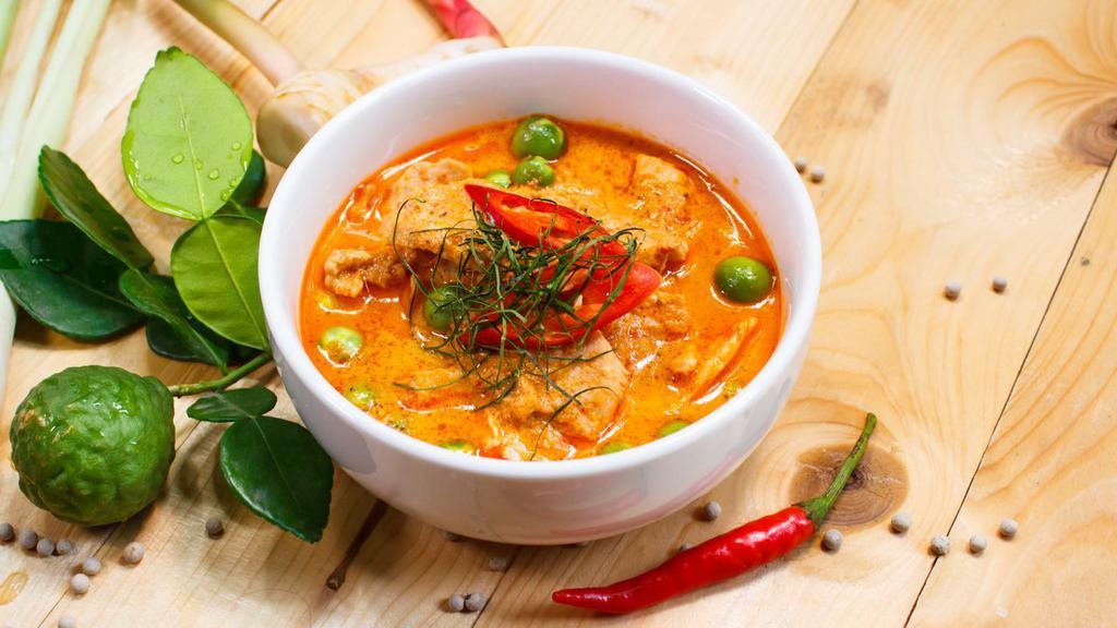 Panang Curry · Delectable curry of carrots, broccoli, kaffir lime leaves, and Thai basil. Comes with Jasmine Rice.