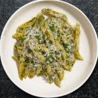 Penne Chicken Pesto · Penne noodles and sautéed chicken with creamy Pesto sauce , topped with Parmesan cheese and ...