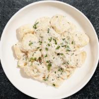Tortellini With Alfredo · Tri-color cheese tortellini in a creamy garlic sauce, with Parmesan and fresh Italian parsley
