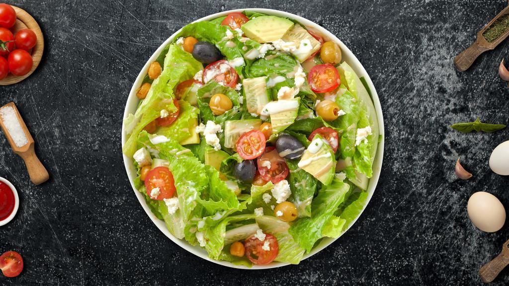 Mediterranean Salad · Tomatoes, cucumbers, Kalamata olives, onions, green peppers, feta cheese, and homemade Italian dressing.