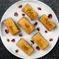 Baklava Bliss · Sweet layers of filo pastry filled with chopped nuts and honey.