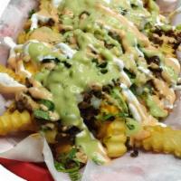 Loaded Fries · Deep fried crinkle cut fries topped with beans, nacho cheese,your choice of meat, fresh onio...