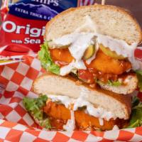 Buffalo Chick-Not Sandwich · Buffalo fried chick'n, tomato, pickle, follow your heart bleu cheese. Served with mac salad.