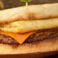 Breakfast Sando · English Muffin, Chipotle Mayo, Syrup drizzle, sausage and egg and cheeze.
Served with Tator ...