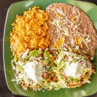 Combination Sopes · Chicken, asada, carnitas and al pastor. Two fresh fried masa topped with refried beans, crum...