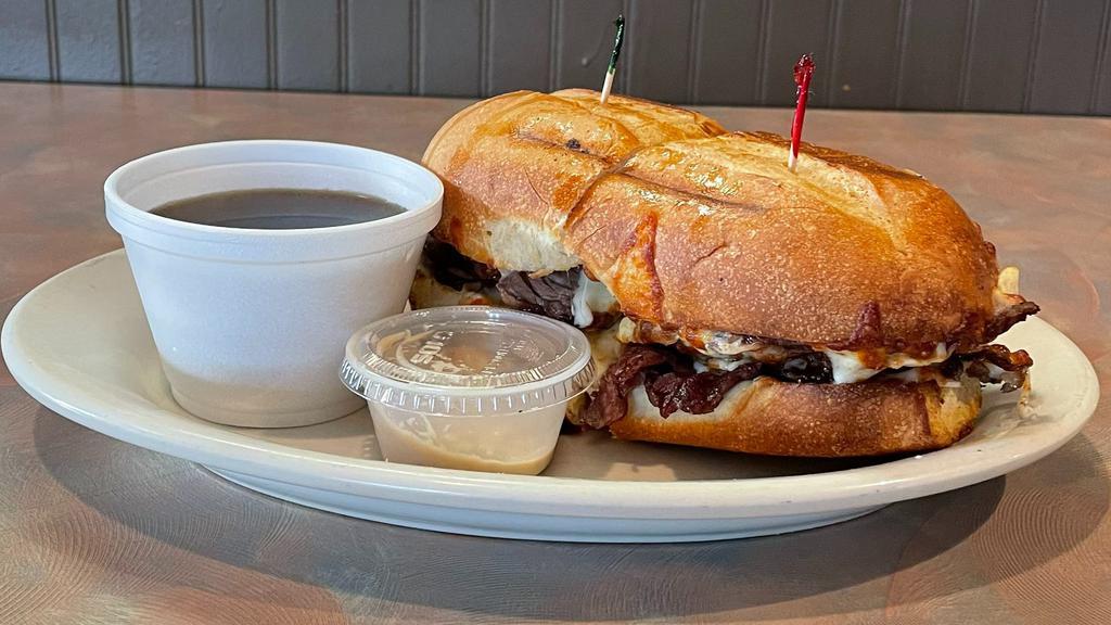 Prime Rib Dip Sandwich · Cooked tomatoes topped with mozzarella cheese. Hot submarines on a French roll with cheese include a dinner salad.
Dressing Choice: Ranch, Italian, Thousand, Caesar, Honey Mustard, French.