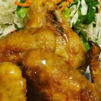 Chicken Wings · deep-fried wings caramelized fish sauce and garlic.