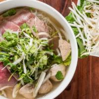 Vietnamese Pho · Beef broth, Rice noodles, Thinly slices steak, Brisket, and Meatballs.