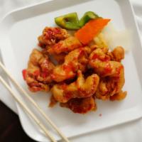 Sweet & Sour Chicken · Deep fried chicken with our special sweet and sour sauce.
