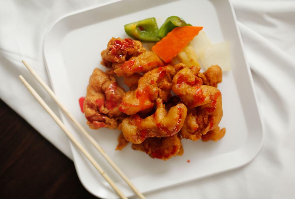Sweet & Sour Chicken · Deep fried chicken with our special sweet and sour sauce.