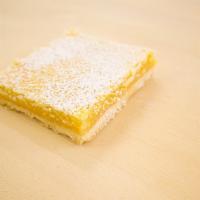 Lemon Bar · Our zesty lemon bar topped with powdered sugar!