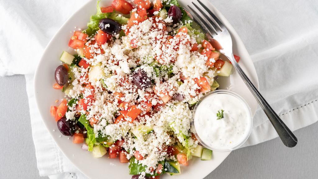 Side Greek Salad · Side greek salad; romaine lettuce, onion, tomato, cucumber, black olives, vinaigrette dressing, Feta cheese and side of Tzatziki