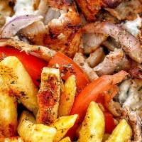 Chicken Shawarma Gyro · Sliced chicken breast sauteed in our special shawarma spices (not spicy). Served in a warm p...