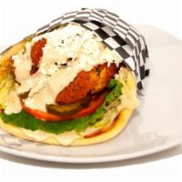 Falafel Gyro · Chickpea patties deep fried to golden perfection. Served in a warm pita with lettuce, tomato...