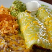 2 Enchiladas · Shredded beef, shredded chicken or ground beef. Your choice of red, green or cheese sauce.