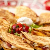 Maria'S Quesadilla · Half shredded chicken, half shredded beef, with a side of guacamole and sour cream, lettuce ...