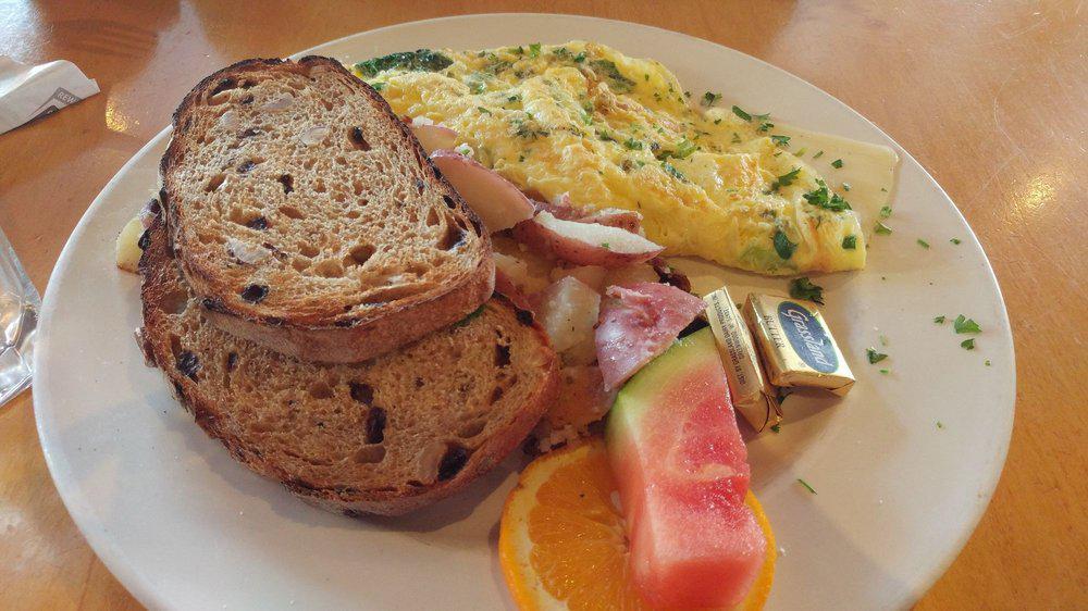Herbed Cheese Omelet · Fresh herbs with swiss cheese. Served with home fries And toast.