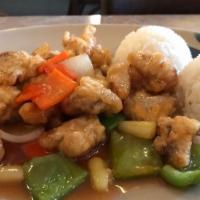 Sweet & Sour Pork · Served with green salad and steamed rice.