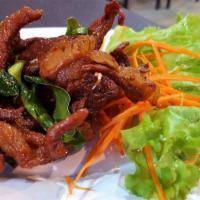 Beef Jerky · Deep fried, marinated beef served with chili sauce.