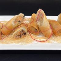 Crispy Rolls · Shrimp, pork, noodles, vegetables wrapped in egg rolls.