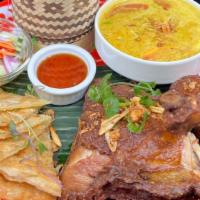 Yellow Curry With Fried Chicken · Thai hat-yai style fried chicken with yellow coconut curry, onion, tomato and potato served ...