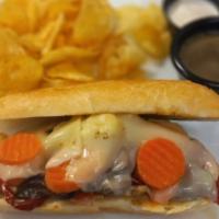 French Dip · Roast beef with au jus on toasty baguette with melted gruyere and spicy giardiniera, and a s...