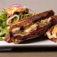 Reuben · Grilled corned beef brisket, gruyère cheese, sauerkraut with 1000 island dressing on toasted...