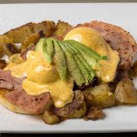 Bennie · Toasted English muffin, poached eggs, shaved apple cider glazed ham, avocado, topped with ho...