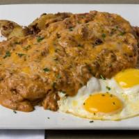 Sterlings Sweet Biscuits · Chipotle cheddar biscuits, chorizo gravy, shredded cheddar cheese, served with two eggs any ...