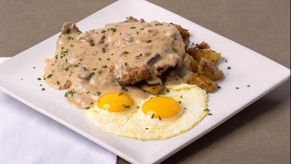 Chicken Fried Steak · 8oz breaded and fried steak, chipped beef country gravy, breakfast potatoes, with two eggs any style.