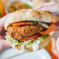 The Bff · Crispy breaded and fried fancy mock chicken with fresh sauteed jalapenos, cheddar, avocado, ...
