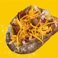 Beef Chili & Cheese · Giant Potato cloud-fluffed inside, loaded with beef & bean chili, topped with cheddar shreds.