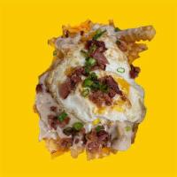 Loaded Breakfast Fries · Giant mound of Crinkles....  stuffed with gravy, Cheddar Cheese, Bacon, Chives & topped with...